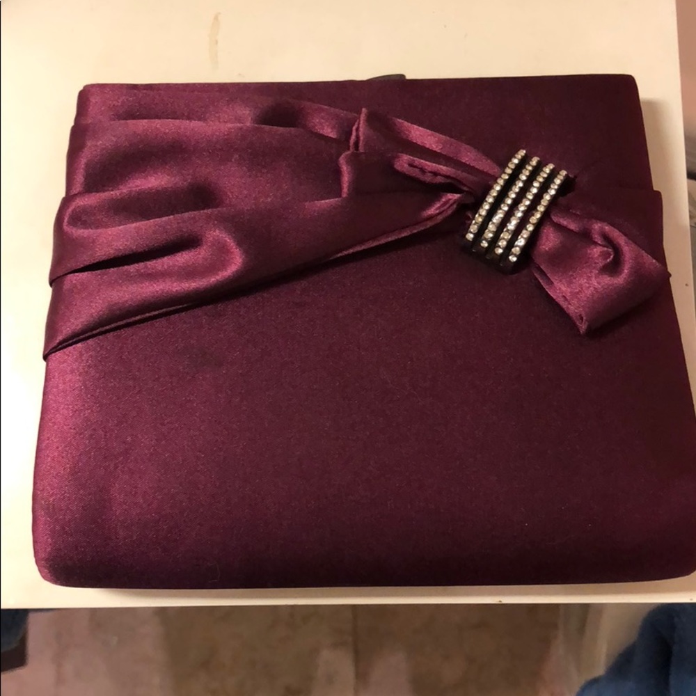Aubergine color clutch